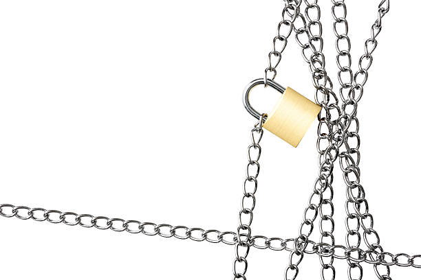 istock Close-up of locked padlock with chain frame on white background 589103758
