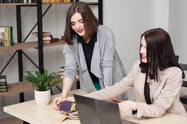 istock Young design team working at desk in office 589104394