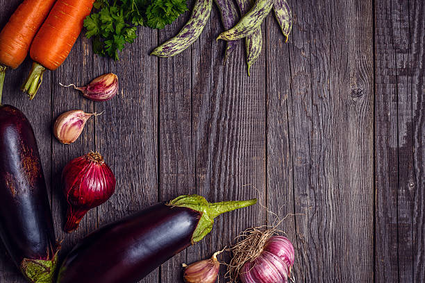 istock Fresh vegetables for cooking on dark wooden background. 589105676