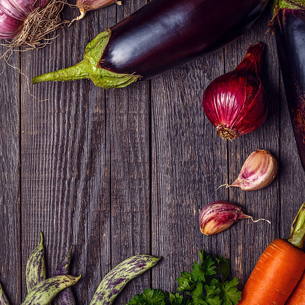 istock Fresh vegetables for cooking on dark wooden background. 589105764