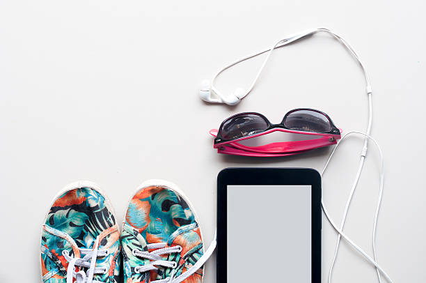 istock the colorful Canvas shoe, white Earphone with sunglasses 589106108