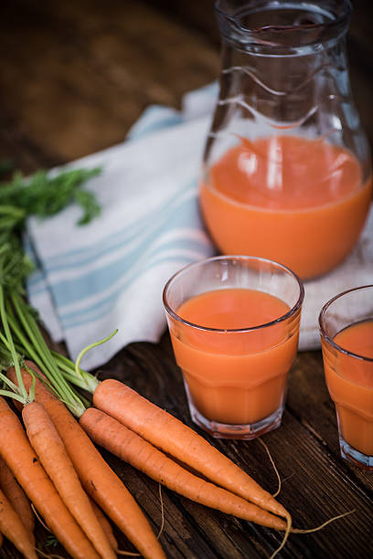 istock carrot juice in pincher 589110806