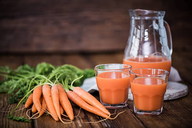 istock carrot juice in pincher 589110854