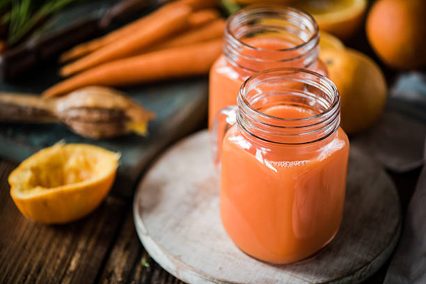 istock carrot and orange detox juice 589111200