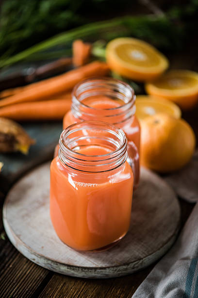 istock carrot and orange detox juice 589111266