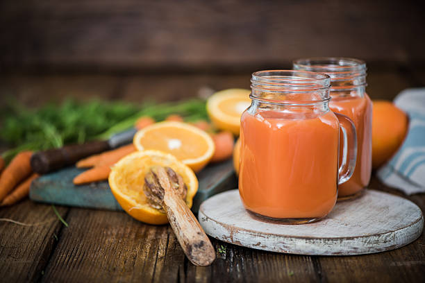 istock carrot and orange detox juice 589111526