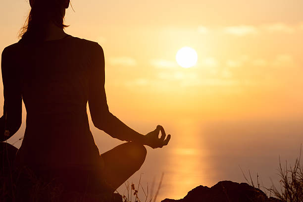 istock Peaceful yoga by the sea 589113830