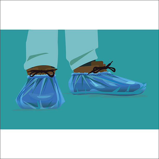 protection on its feet for the hospital, shoe covers cellophane protection on its feet for the hospital, shoe covers cellophane, blue, vector, Blue medical shoe covers are worn over shoes on the floor in hospital, black leather mens shoes in overshoes, river wear stock illustrations