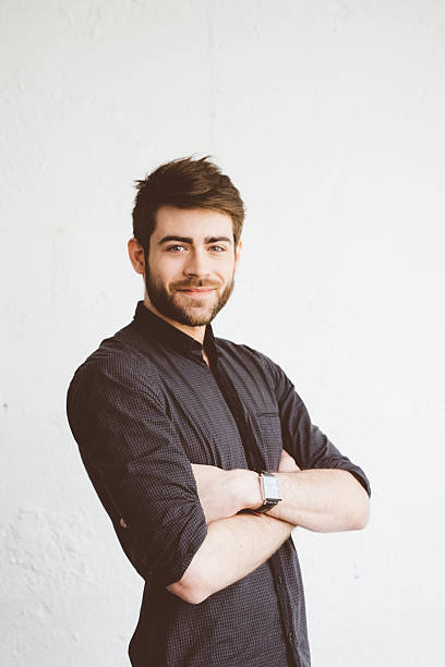 istock Portrait of a cheerful young man 589119120