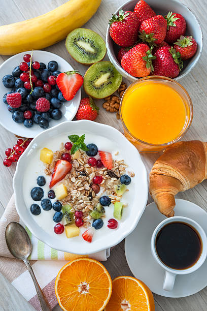 istock Yogurt with muesli and fresh fruits 589121376