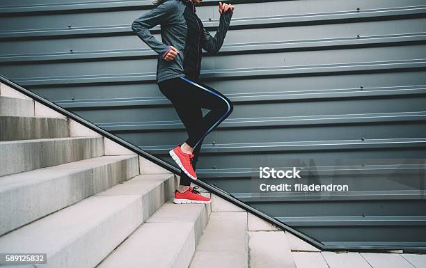 Running Down The Stairs Stock Photo - Download Image Now - Staircase, Running, Moving Down