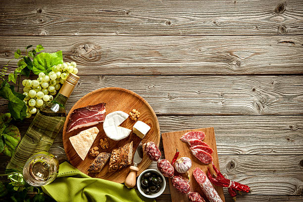 istock Romantic dinner with wine, cheese and traditional sausages 589126110