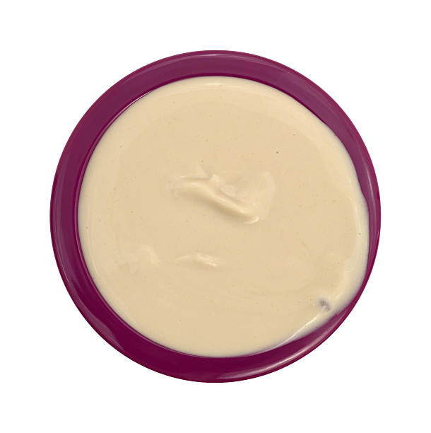istock Overflowing bowl of coffee flavored yogurt 589126124