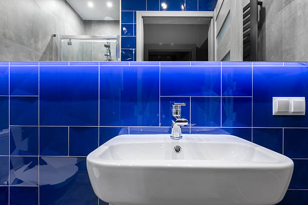 istock Bathroom with crystal blue tiles idea 589127362