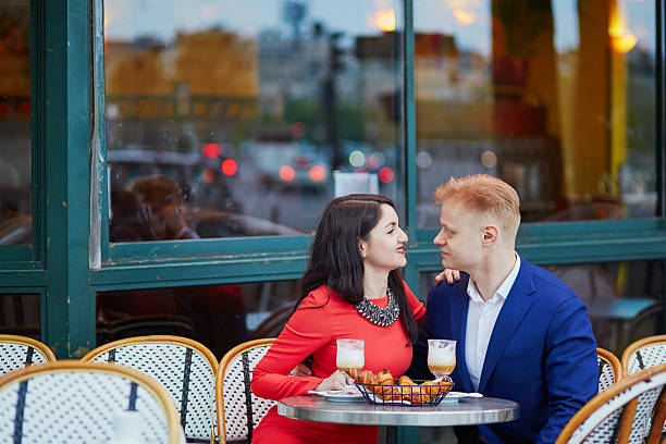 istock Romantic couple in Paris in cafe 589127612