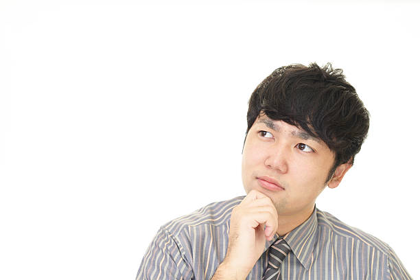 istock Uneasy Asian Businessman 589127820