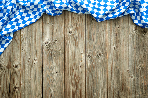Rustic background for Beer Fest with bavarian white and blue fabric