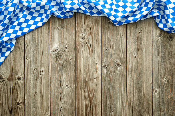 Rustic background for Beer Fest Rustic background for Beer Fest with bavarian white and blue fabric beer festival photos stock pictures, royalty-free photos & images