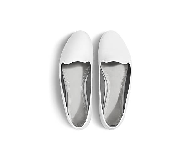 White blank women shoes mockup isolated, top view, clipping path. White blank women shoes mockup stand isolated, top view, clipping path. Female ballet foot wear design mock up with clear insole. Clean lady footwear template wth flat slip. Dance girls shoe display. flat shoe stock pictures, royalty-free photos & images