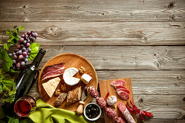 istock Romantic dinner with wine, cheese and traditional sausages 589128858