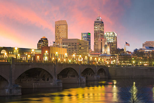 Indianapolis skyline and the White River Indianapolis skyline and the White River at twilight indianapolis photos stock pictures, royalty-free photos & images
