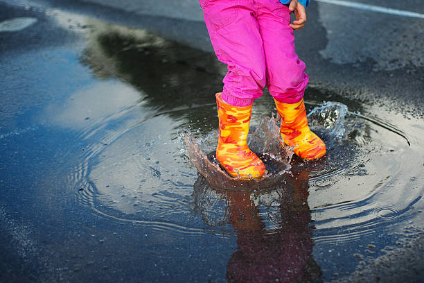 istock The jump in a puddle 589132706