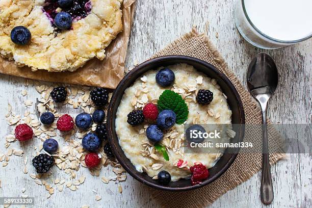 Healthy Breakfast Oatmeal Homemade Blueberry Cake And Milk Stock Photo - Download Image Now