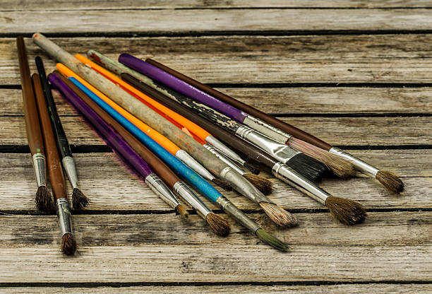 istock paint brushes of different colors 589133740