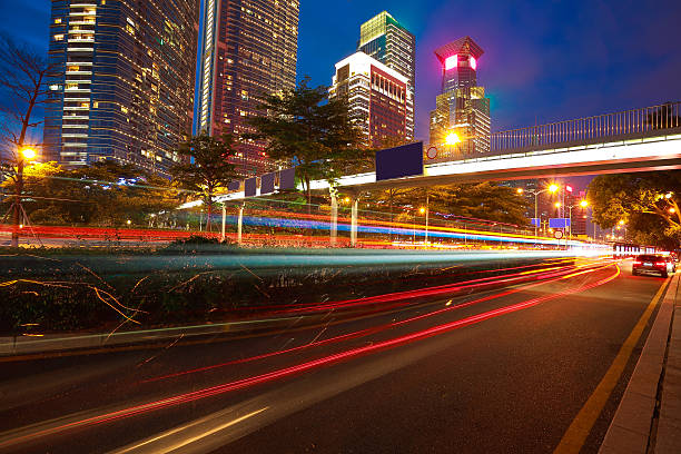 istock Empty road surface floor with modern city landmark architecture backgrounds 589134542