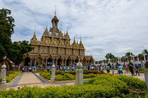 Uthai Thani, Thailand - August 12, 2016: On Mother's Day,Tourists are walking in gounds of Wat Thasung or Wat Chantaram in Uthai Thani Province, Thailand.