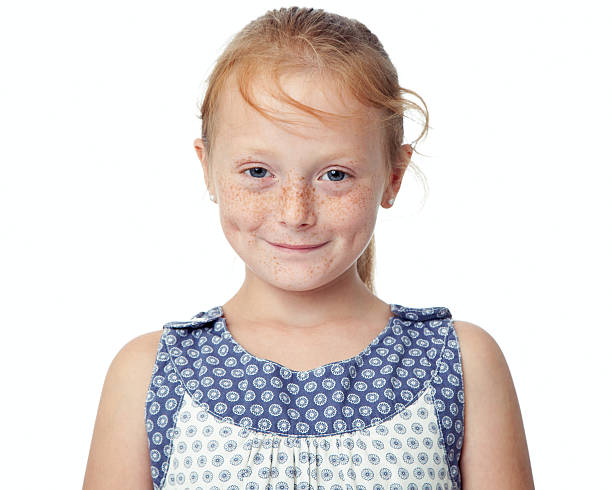 Close up little ginger girl smiling, isolated on white background