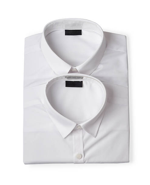 istock Two folded white new men's shirts c 589415002