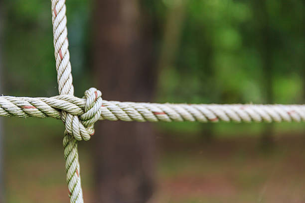 istock rope tied knot be net close up 589415718