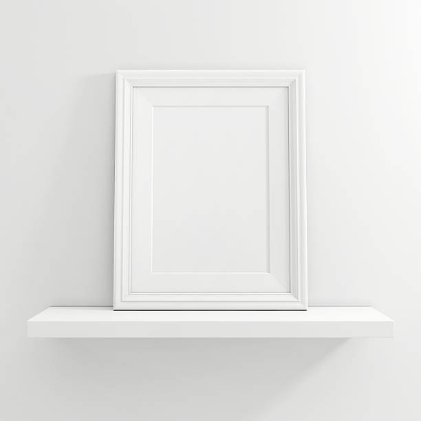 white blank photo frame on white shelf on white background