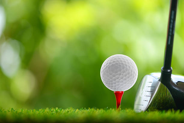drive golf drive a golf ball on tee taking a shot sport photos stock pictures, royalty-free photos & images