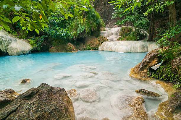 istock The blue lagoon at Erawan waterfall in Thailand #1 589418866