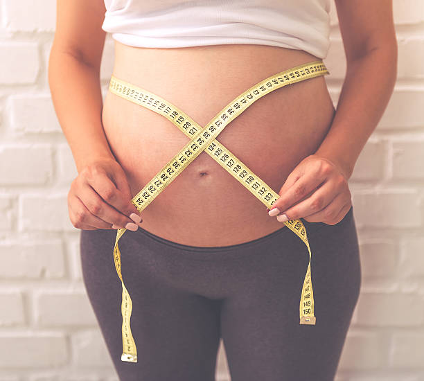 istock Beautiful pregnant woman 589419754
