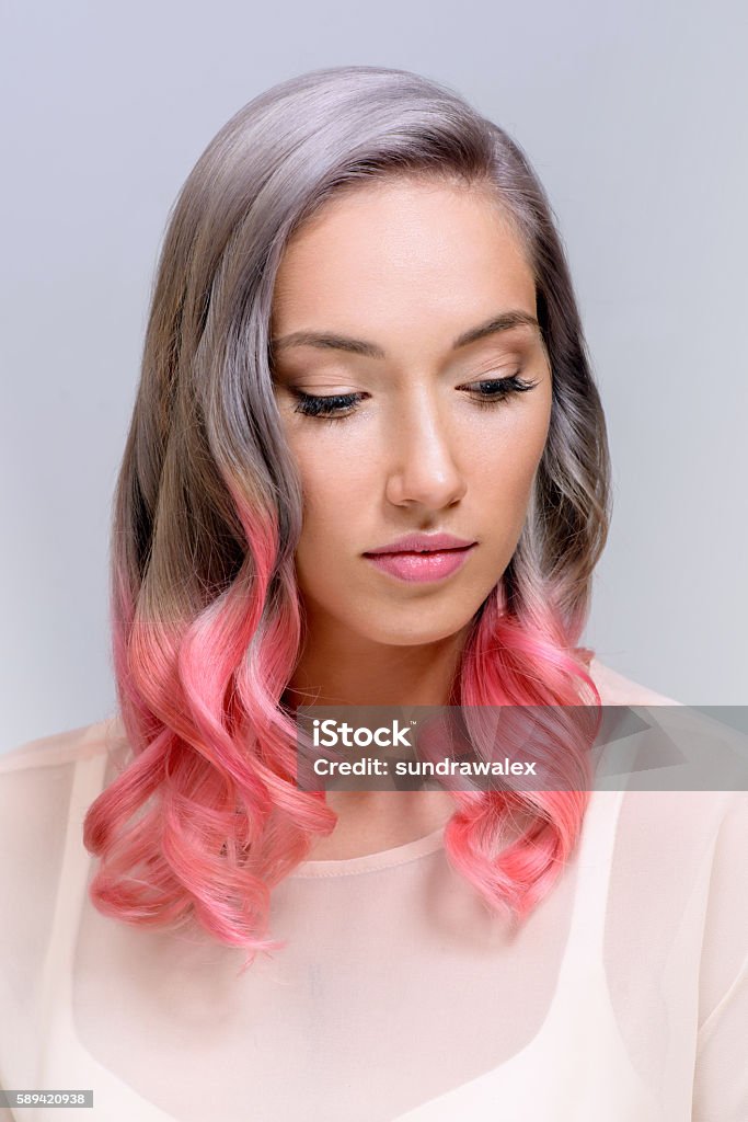 girl with professional hair colouring and hairstyle Portrait of a beautiful girl with dyed hair, professional hair colouring Dyed Hair Stock Photo