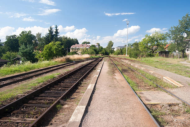 istock railway platform and tracks on local railroad 589422920