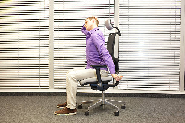istock white collar worker male relaxing neck 589428016