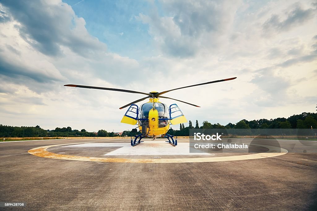 Air rescue service Air rescue service. Helicopter air ambulance is ready for take off at the heliport. Medevac Stock Photo