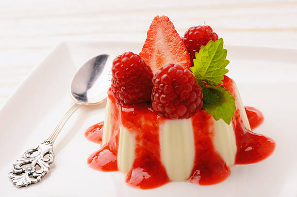 istock Panna cotta with strawberry mousse and raspberries. 589430504
