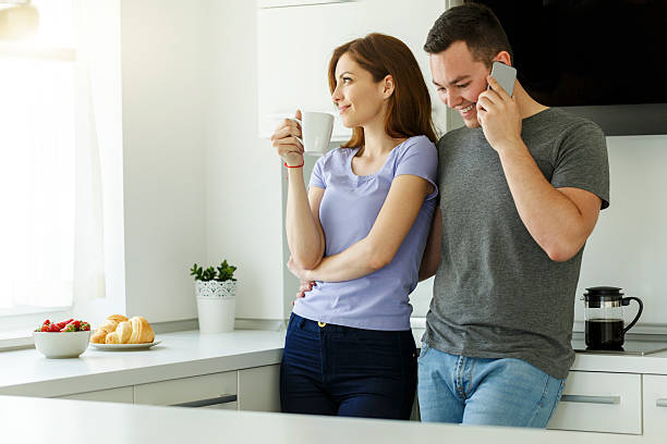 istock Young couple in the kitchen 589432800