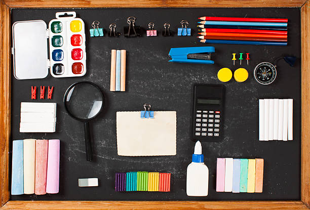 istock Stationery on a black background with space for text. 589433956