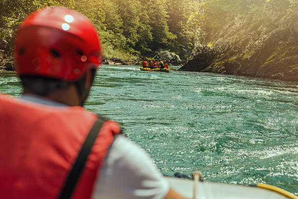 istock Rafting, boat trip. Front view with sunligh 589436304