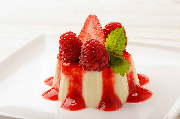 istock Panna cotta with strawberry mousse and raspberries. 589437170