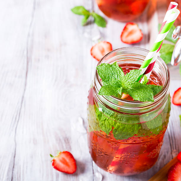 istock Glass jar with homemade strawberry compote 589440390