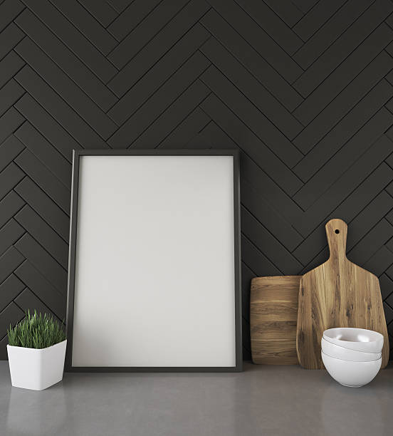 istock Kitchen counter with picture and black wall 589443902