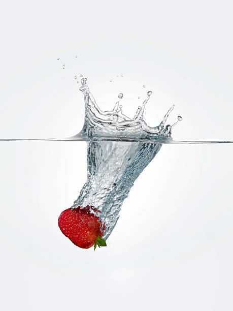 Strawberry Falling In Water
