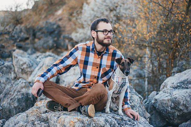 istock The guy with the dog 589446188